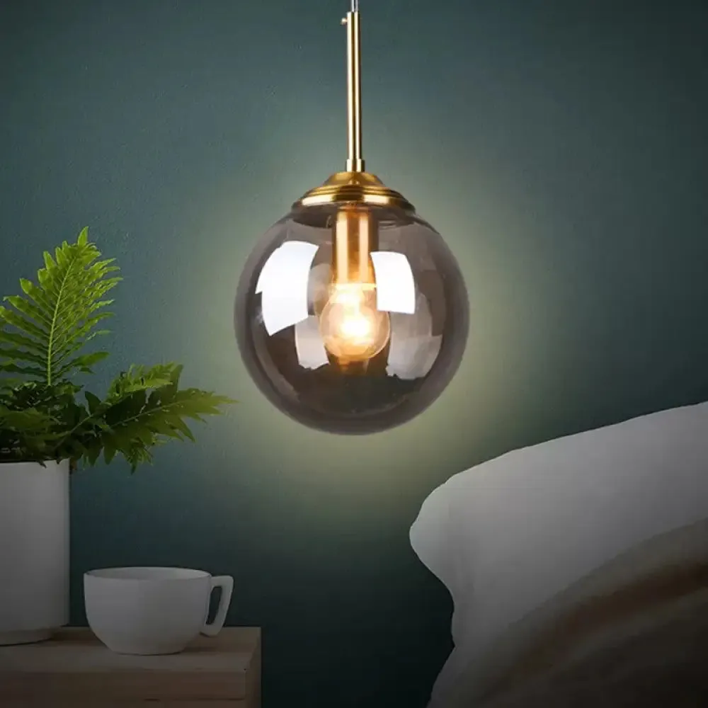 Sleek Brass Pendant Lamp with Amber/Smoke Glass Shade – Perfect for Dining Room Ceilings