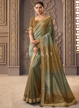 Teal Golden Zari Embroidery Shaded Organza Silk Saree